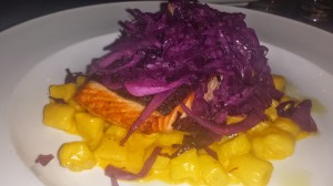 Salmon, gnocchi, saffron cream sauce, & sauteed red cabbage