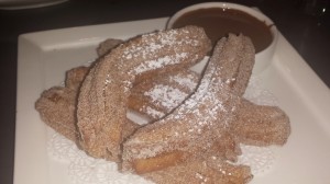 Zeppole (Italian doughnuts with chocolate sauce)